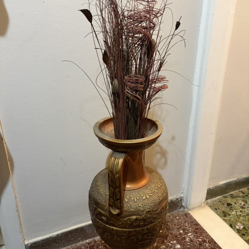 Antique amphora used with a break at the bottom