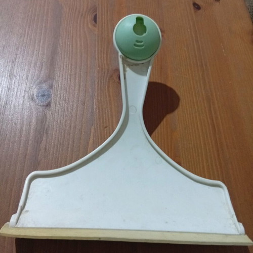 Window scraper used for cleaning glass