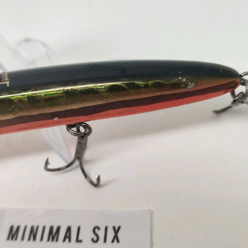 Lammtarra artificial lure used, dark olive with golden green and orange belly