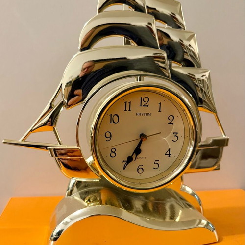 Decorative ship clock used, gold plastic
