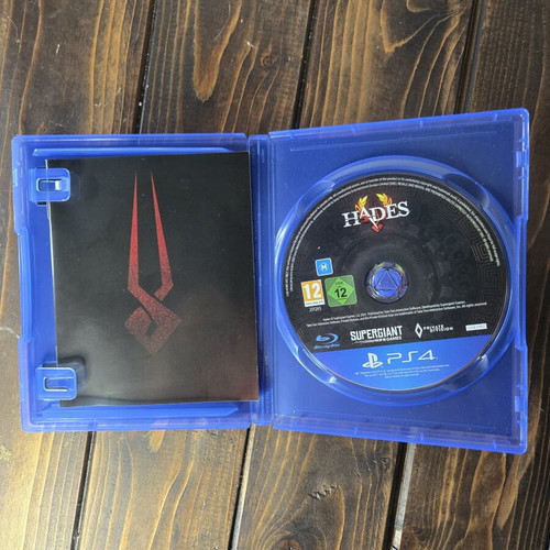 Hades PS4 game with booklet