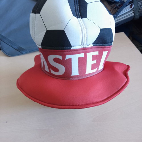 Amstel promotional collectible hat shaped like a football