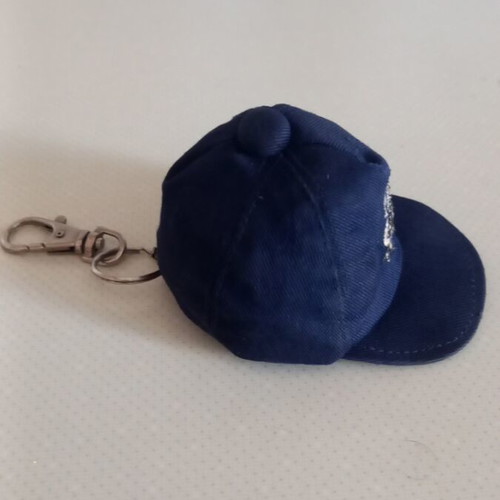 Collectible keychain in hat shape like new