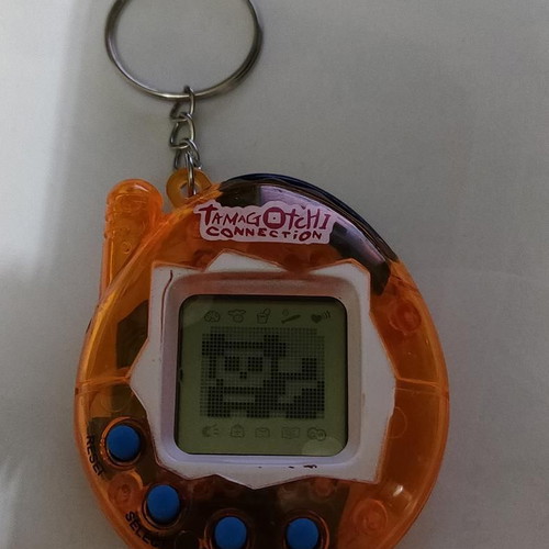 Tamagotchi Connection Orange Transparent like new