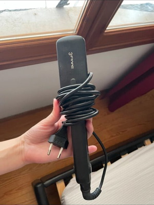 Hair straightener used, flat iron