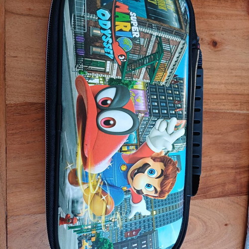 Nintendo Switch Super Mario Odyssey case like new with two game cartridge cases gift