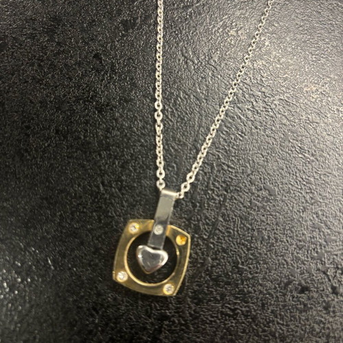 Necklace used with one missing rhinestone in excellent condition