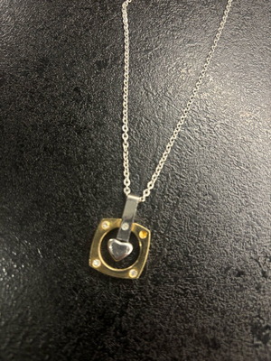 Necklace used with one missing rhinestone in excellent condition