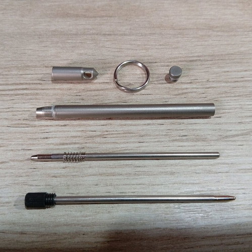 Mini tactical titanium pen new with glass breaker tip and refill