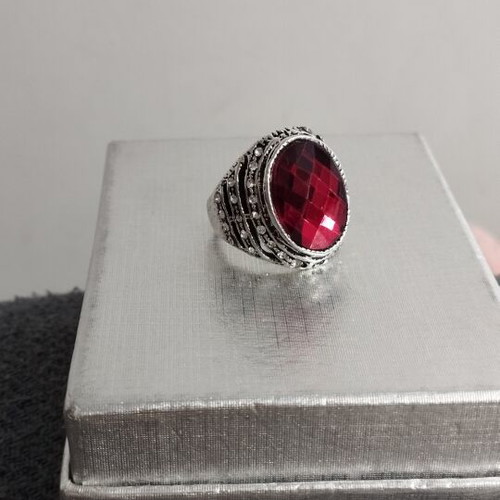 Statement cocktail ring with large red stone and rhinestones
