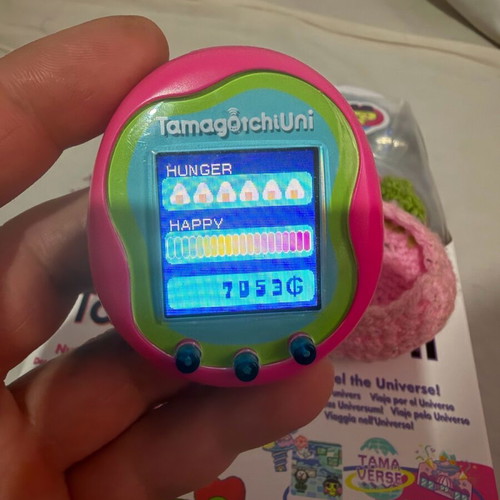 Tamagotchi Uni Pink virtual pet like new with box and accessories