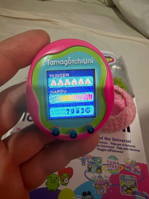 Tamagotchi Uni Pink virtual pet like new with box and accessories