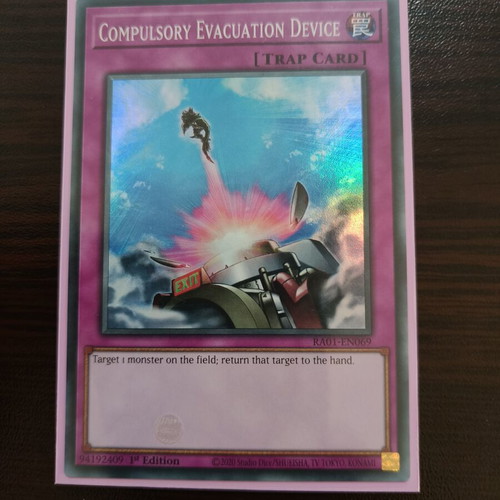 Yu-Gi-Oh Compulsory Evacuation Device card like new, super rare