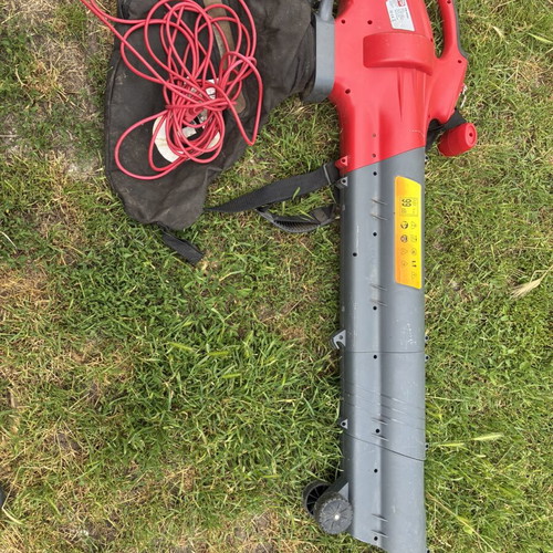 Leaf collector like new, blows and collects leaves and debris