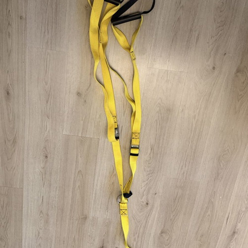 TRX straps used, yellow color, without hook
