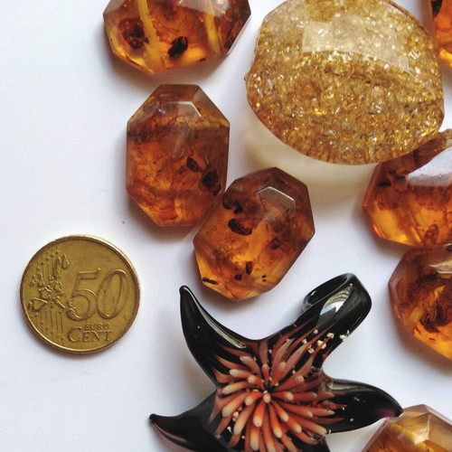 Acrylic beads used, amber-like pack with large bead and glass starfish motif