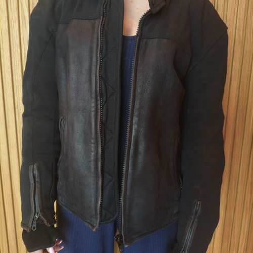 Motorcycle jacket used with hard protectors and leather