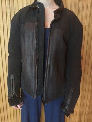 Motorcycle jacket used with hard protectors and leather