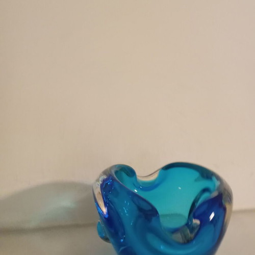Blue glass ashtray like new, can be used as candle holder
