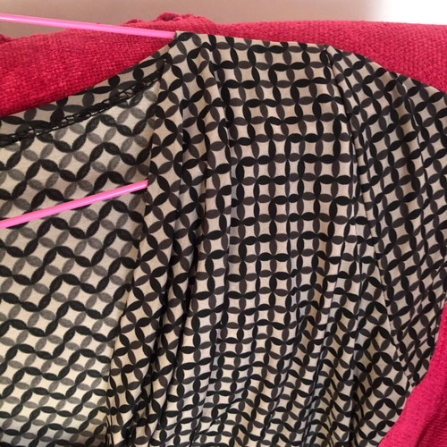 Draped dress used with geometric pattern in black and gray