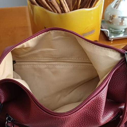 Handbag new, wine color with multiple external pockets