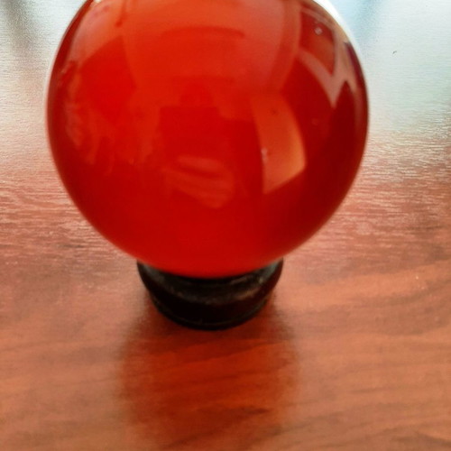 Indian crystal sphere red color on wooden base new