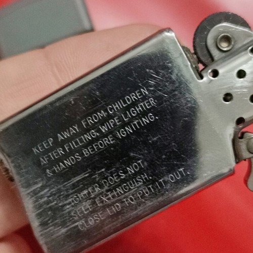 Slim Zippo lighter used, collectible (1989)