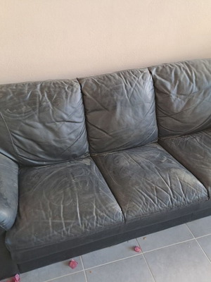 Leather three-seater sofa used