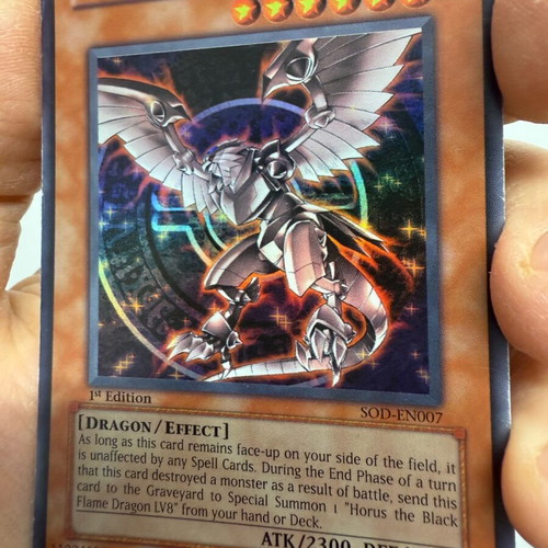 Yu-Gi-Oh Horus the Black Flame Dragon LV 6 1st edition gold card used ultimate rare