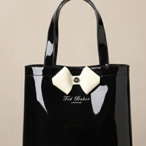 Ted Baker waterproof handbag like new, black with white bow
