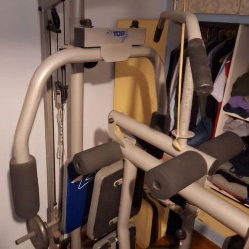 Fitness multi-gym like new with 2 discs 10kg and 2 discs 5kg