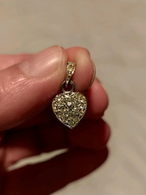 Heart-shaped pendant like new, silver