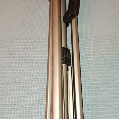 Folding photographic tripod used