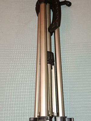 Folding photographic tripod used