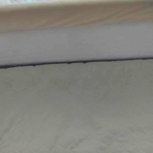 Bonne Nuit baby cot like new with mattress and adjustable height