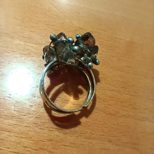 Faux ring with intricate design and adjustable size, new, silver
