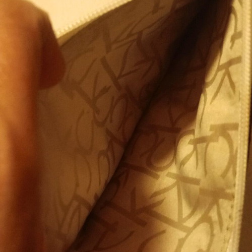Calvin Klein Monogram Wristlet pouch cream and tan, like new
