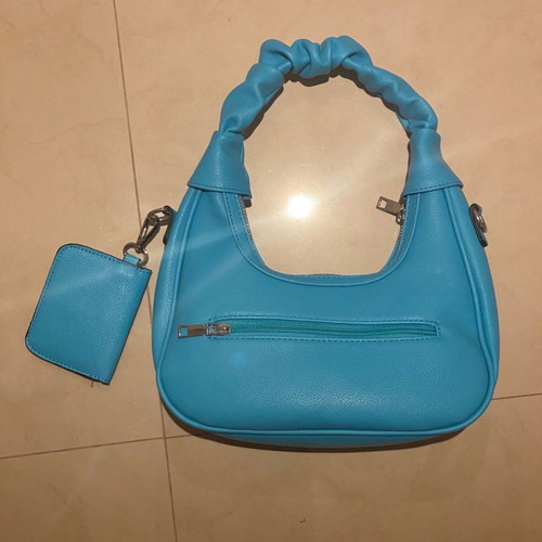 Blue leatherette shoulder bag with multiple compartments