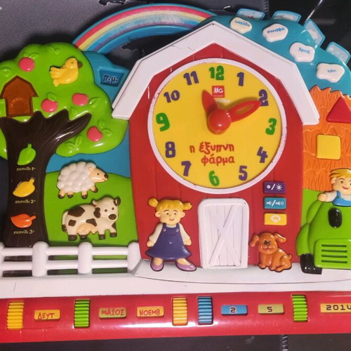 Educational toy The Smart Farm used with time and weather learning