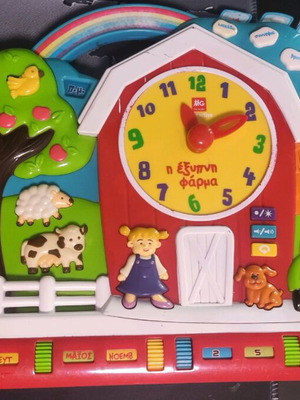 Educational toy The Smart Farm used with time and weather learning