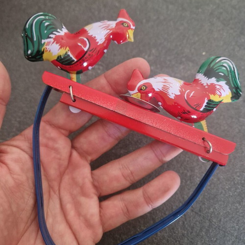Vintage tin toy with two roosters, like new