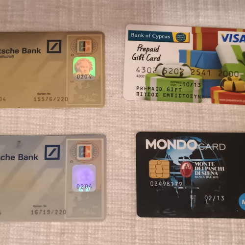 Collection of 4 international bank cards like new, plastic laminated