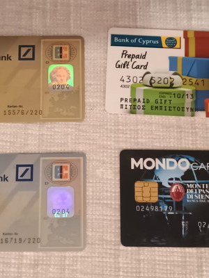 Collection of 4 international bank cards like new, plastic laminated