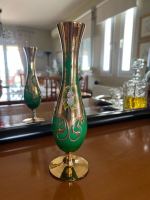 Decorative vase used with embossed details and handmade painting