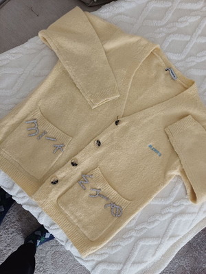 Milkwhite cardigan used, knitted in soft yellow with rhinestones