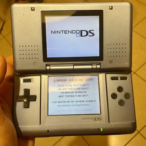 Nintendo DS Fat console with charger and stylus