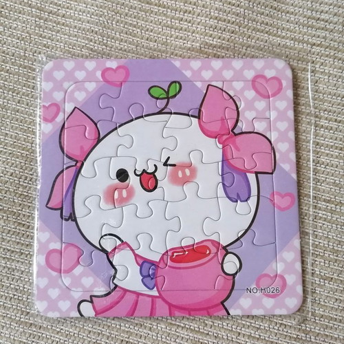 Puzzle in packaging, 14 x 14 cm