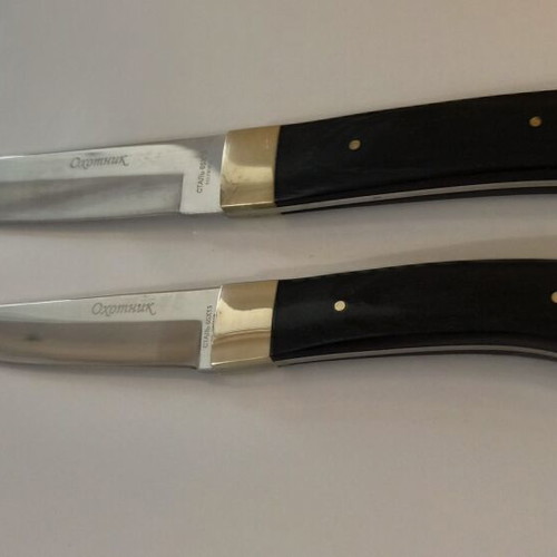 Russian Ohotnik knives new, 65x13 steel, black wood handle