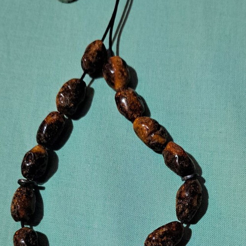 Amber Komboloi like new with silver handmade finish and insect bead