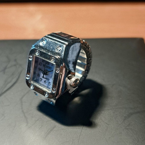 Ring watch quartz with purple dial and silver bracelet like new